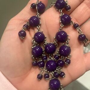 Luxurious Purple Gemstone Necklace with Intricate Design